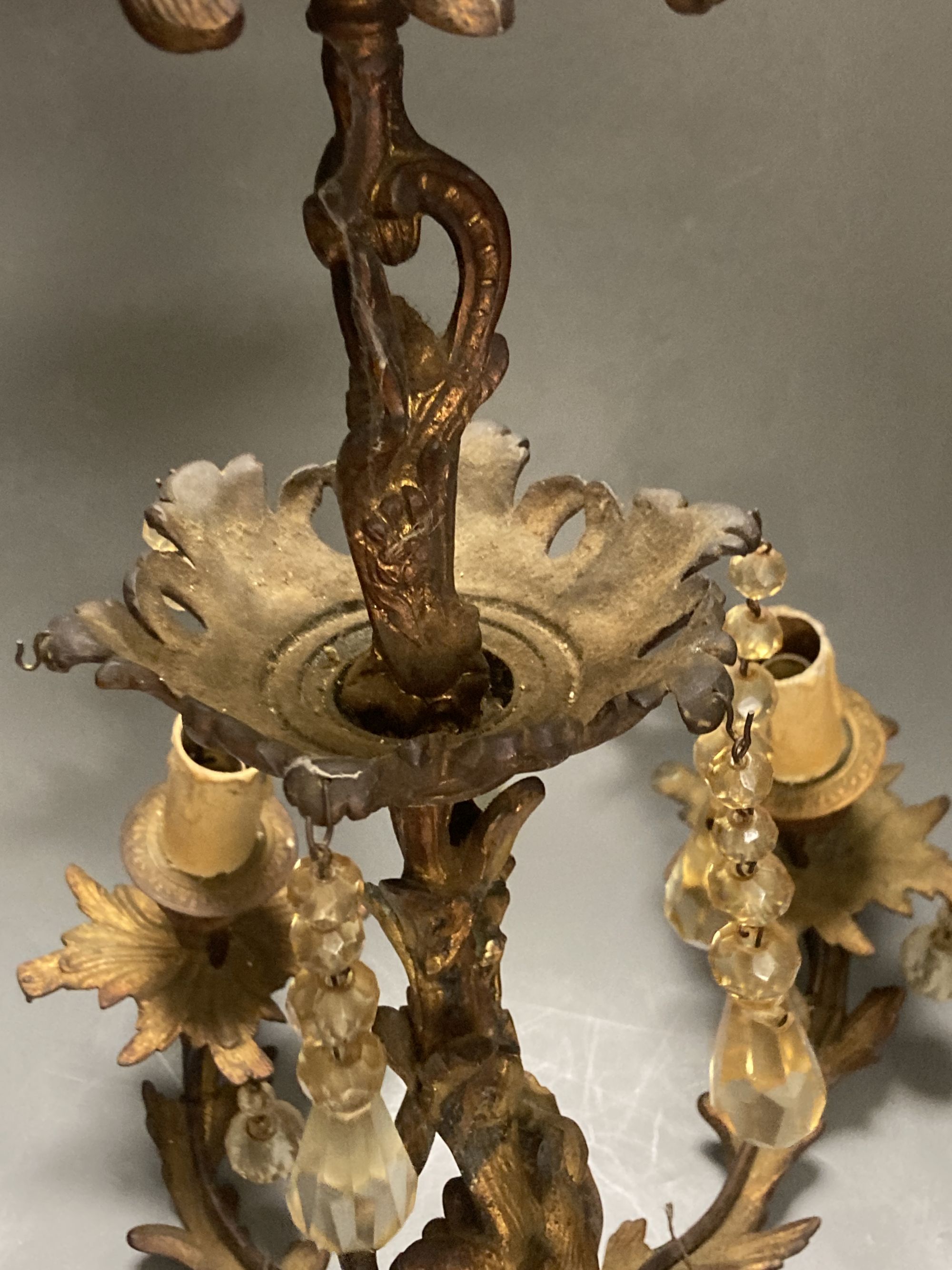 A six branch gilt metal and lustre electrolier